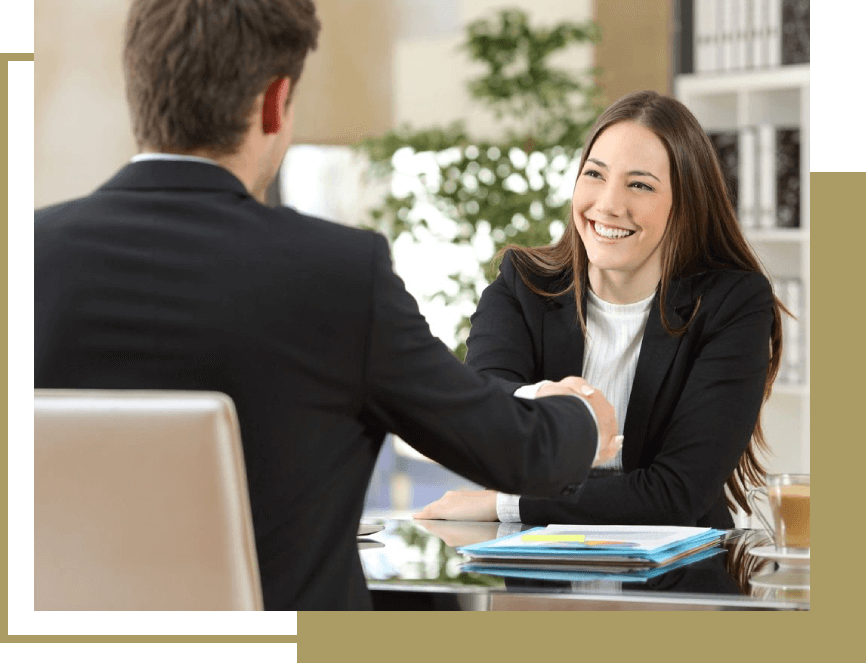 Young Businessman and Businesswoman Discussing by handshake